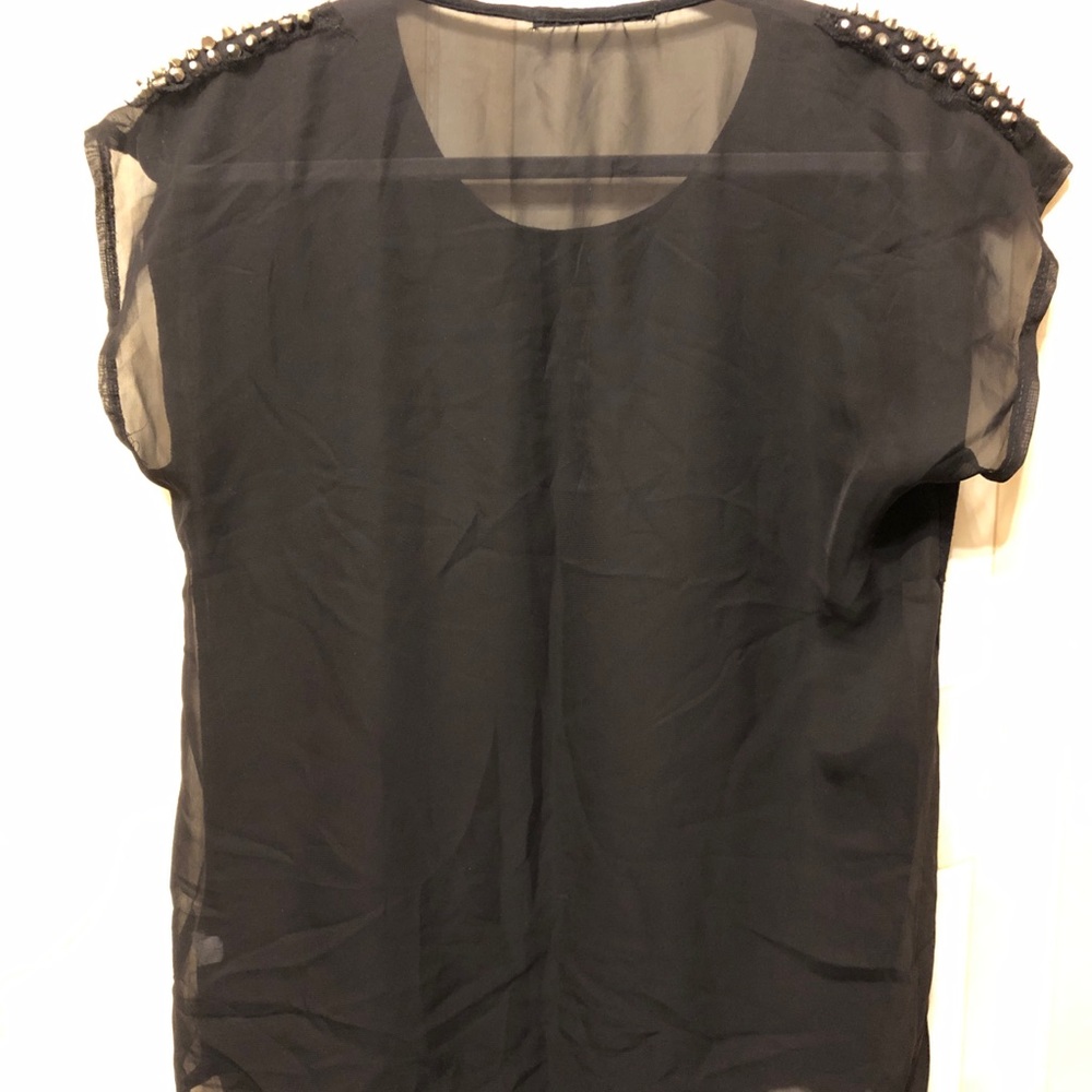 One: 11 very light with mesh back studded shoulder